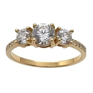 Anillo de compromiso tresillo con tres circones en oro amarillo 18 kilates - Joyería Carolina